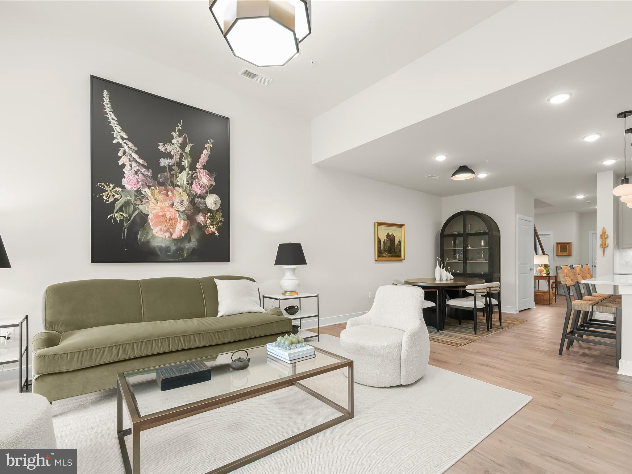8023 Jennys Way, Unit 9 Fulton, MD 20759 - Photo 7 of 46 a living room with furniture and wooden floor