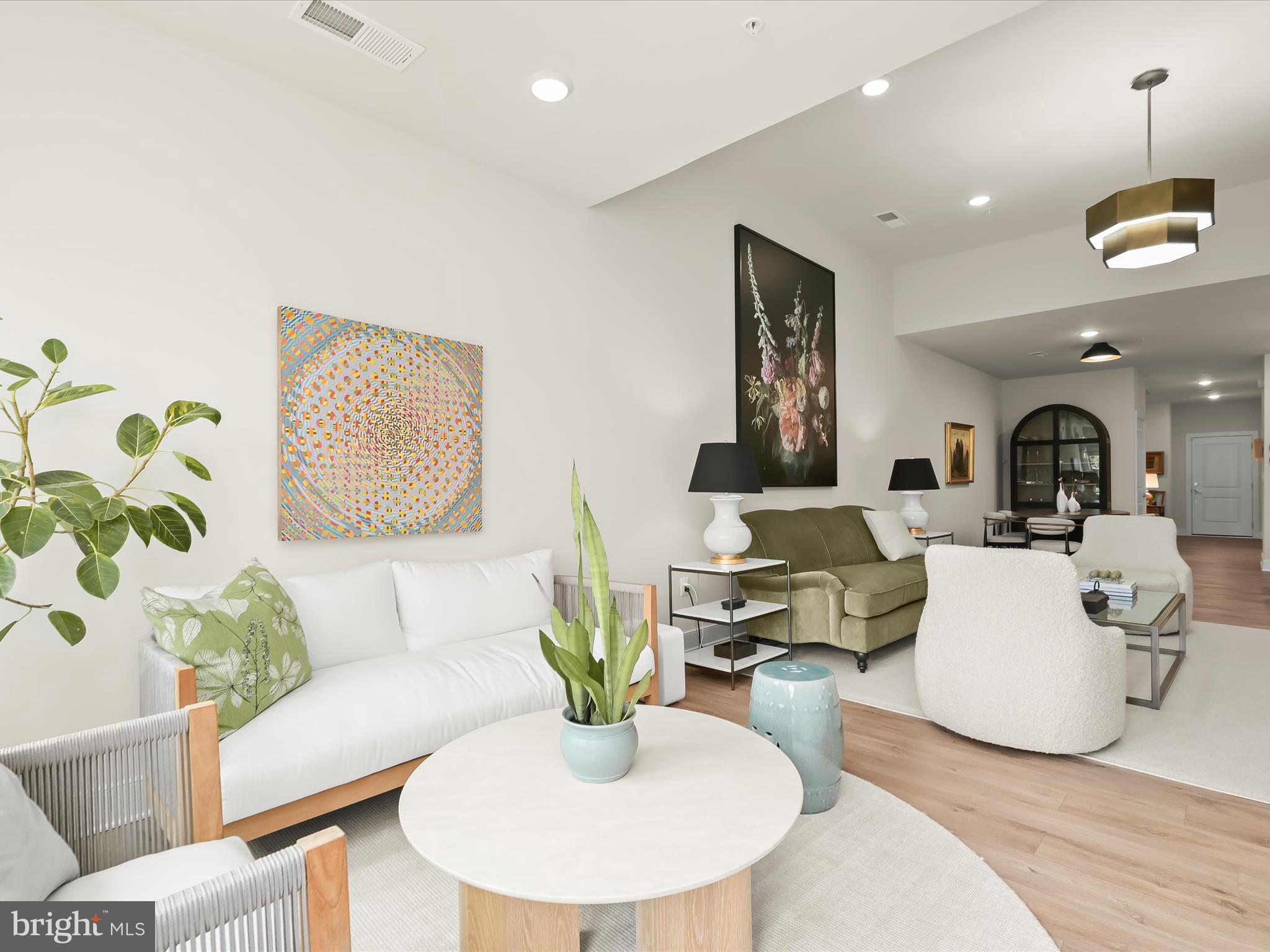 8023 Jennys Way, Unit 9 Fulton, MD 20759 - Photo 9 of 46 a living room with fireplace furniture and a wooden floor