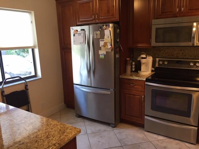 22065 Las Brisas Circle, Unit 407 Boca Raton, FL 33433 - Photo 4 of 13 kitchen 2