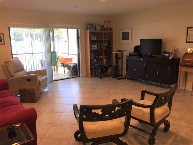 22065 Las Brisas Circle, Unit 407 Boca Raton, FL 33433 - Photo 7 of 13 living room 2