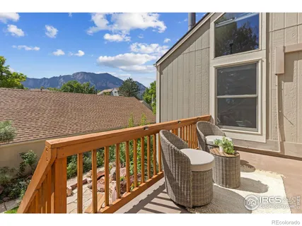 an aerial view of a house with a lake view