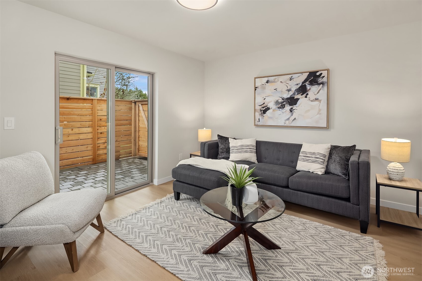 1153 Northwest 58th Street Seattle, WA 98107 - Photo 4 of 29 a living room with furniture and a window