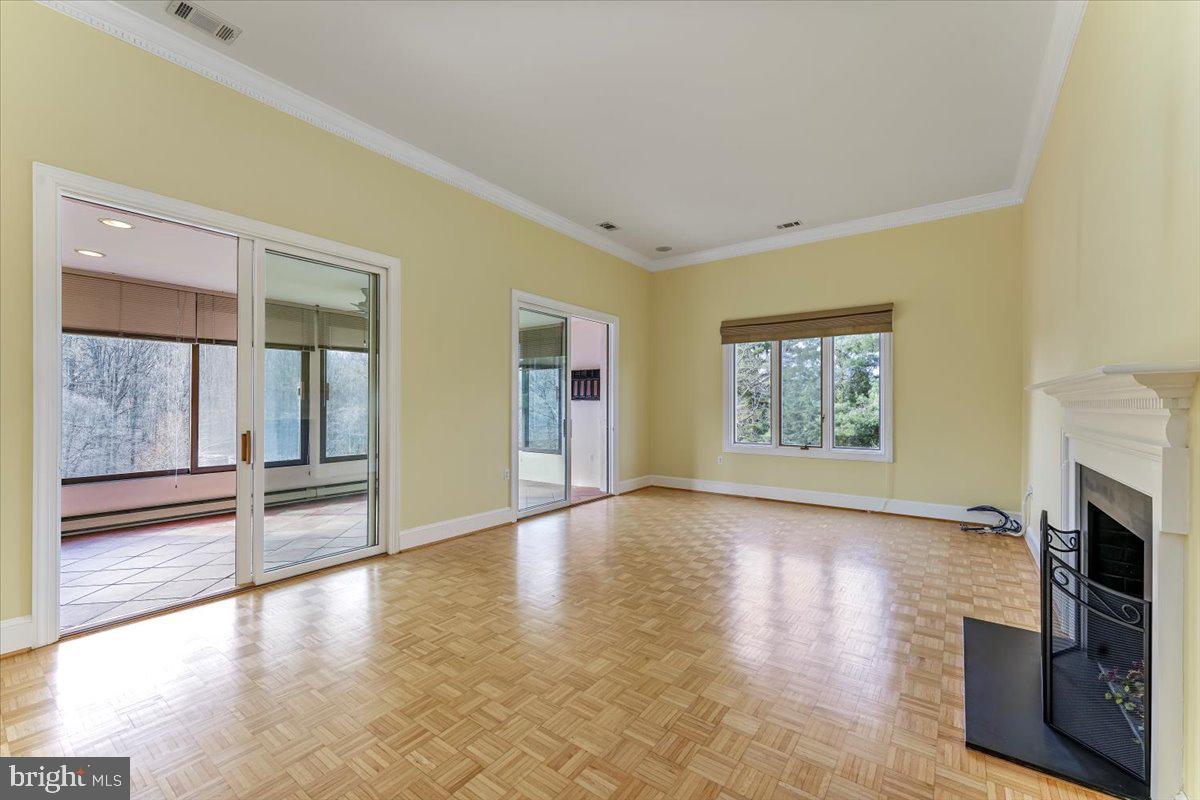 6 Ringfield Road, Unit B3 Chadds Ford, PA 19317 - Photo 11 of 50 Family Room with Crown Molding and Wood Floors