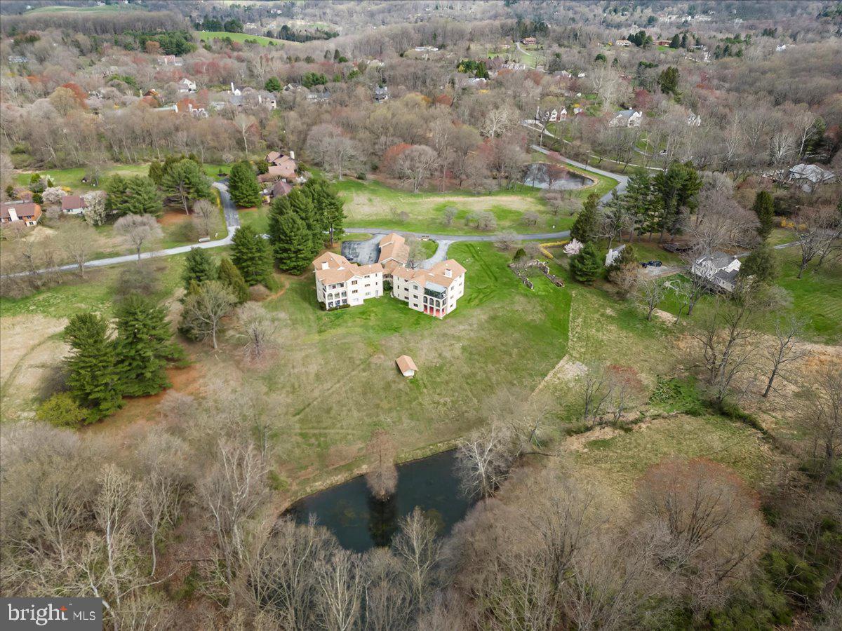 6 Ringfield Road, Unit B3 Chadds Ford, PA 19317 - Photo 2 of 50 Set amongst protected open space with pond views