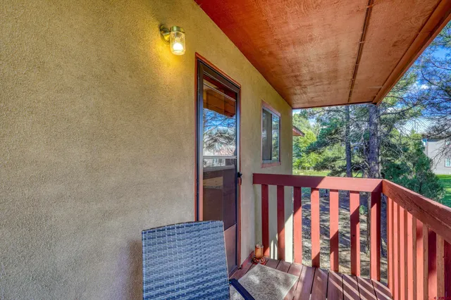 a view of wooden balcony and wooden floor