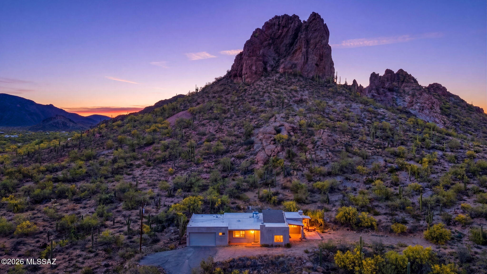 3940 West Alvaro Road Tucson, AZ 85746 - Photo 1 of 44 A home with a captivating presence