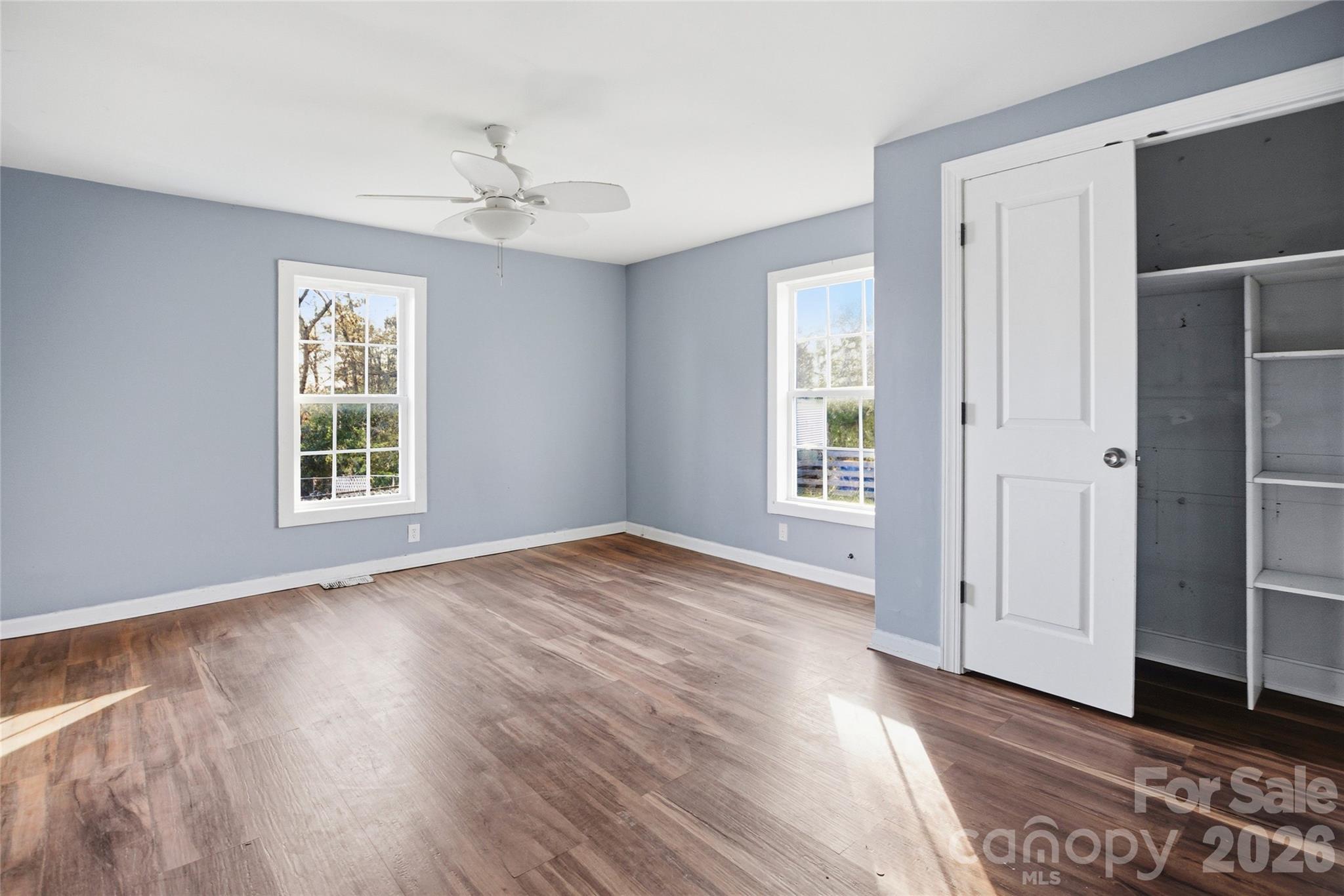 1022 Pine Ridge Road Chester, SC 29706 - Photo 11 of 13 a view of an empty room with wooden floor and a window