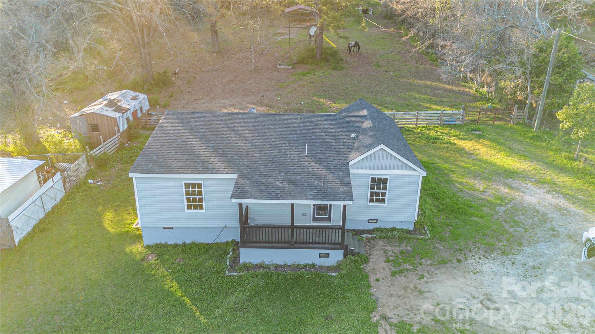 1022 Pine Ridge Road Chester, SC 29706 - Photo 2 of 13 an aerial view of a house with a yard