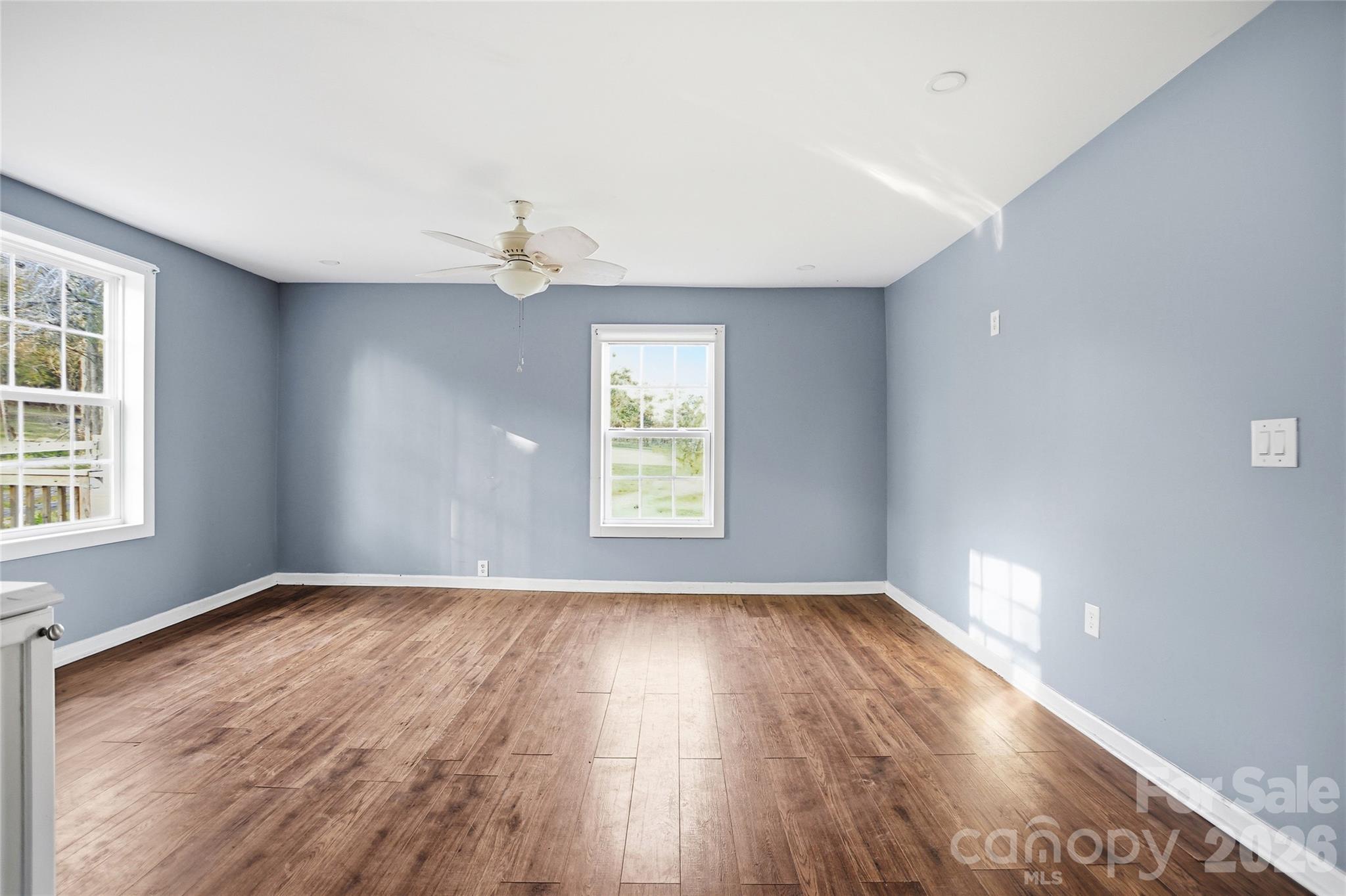 1022 Pine Ridge Road Chester, SC 29706 - Photo 6 of 13 wooden floor in an empty room with a window