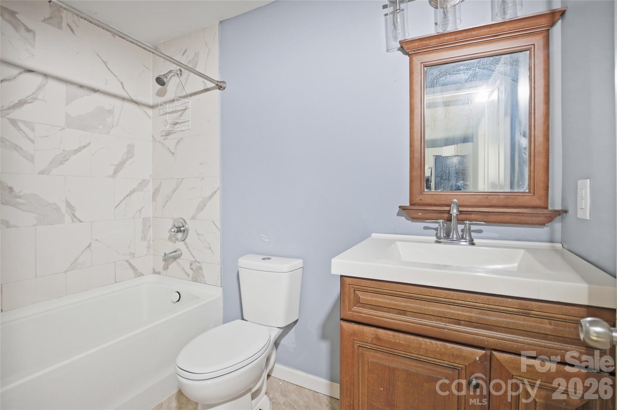 1022 Pine Ridge Road Chester, SC 29706 - Photo 10 of 13 a bathroom with a sink toilet and shower