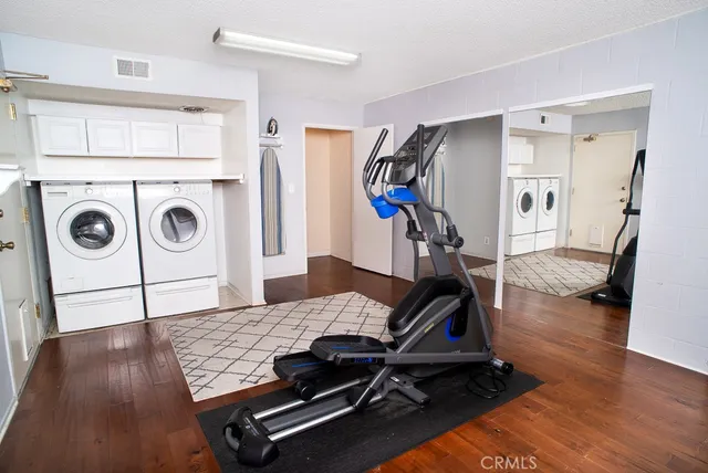 a view of a room with gym equipment