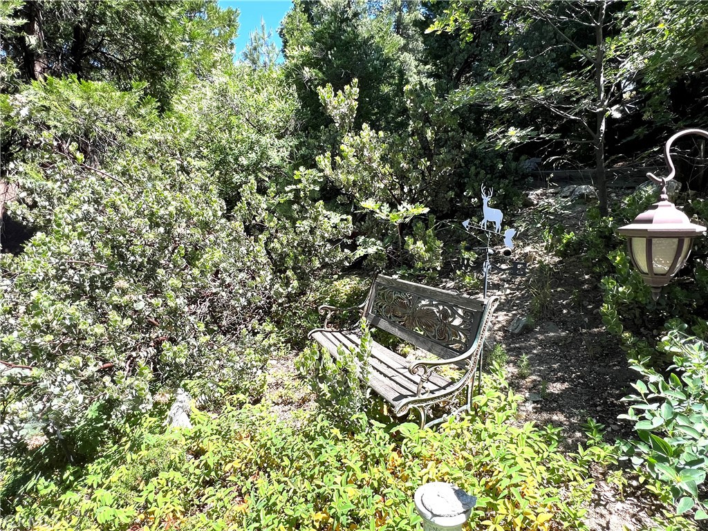 329 Grass Valley Road Lake Arrowhead, CA 92352 - Photo 26 of 31 a view of an outdoor sitting area