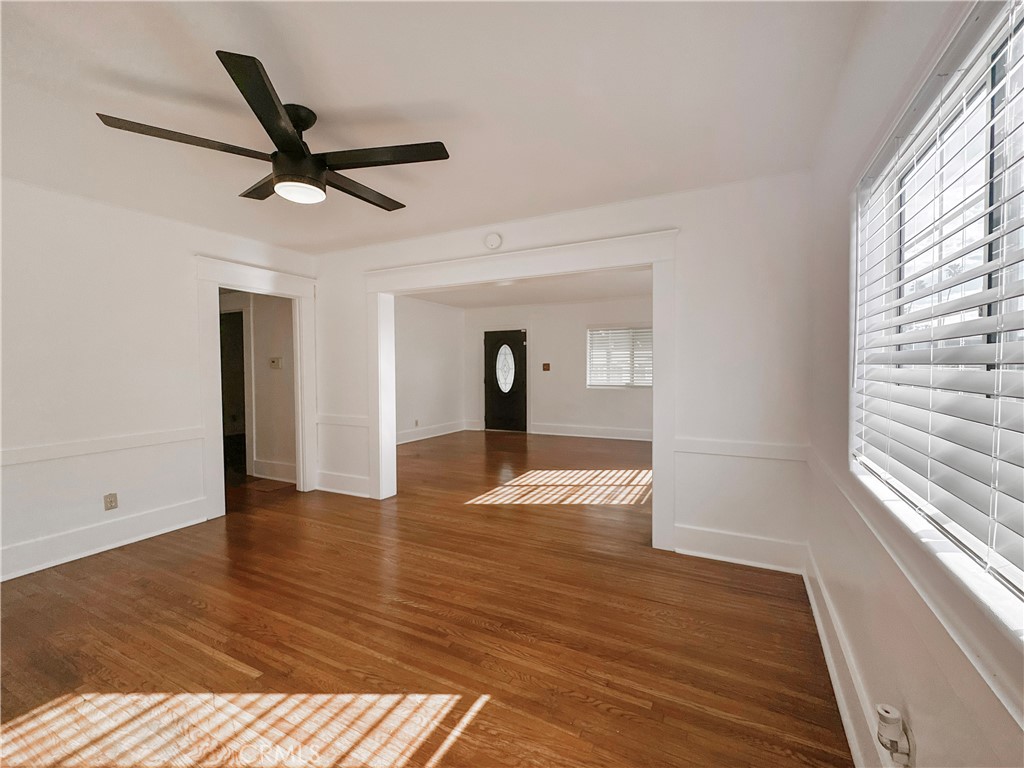 209 Elm Street Alhambra, CA 91801 - Photo 5 of 17 a view of empty room with wooden floor and fan