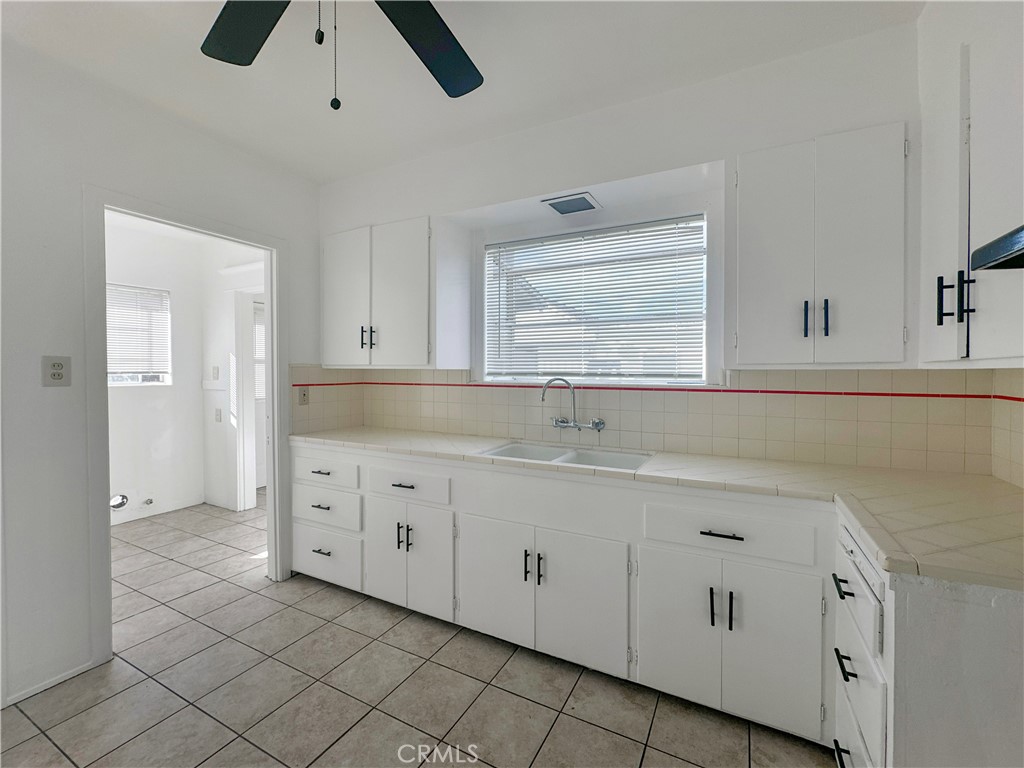 209 Elm Street Alhambra, CA 91801 - Photo 6 of 17 a bathroom with a sink and a mirror