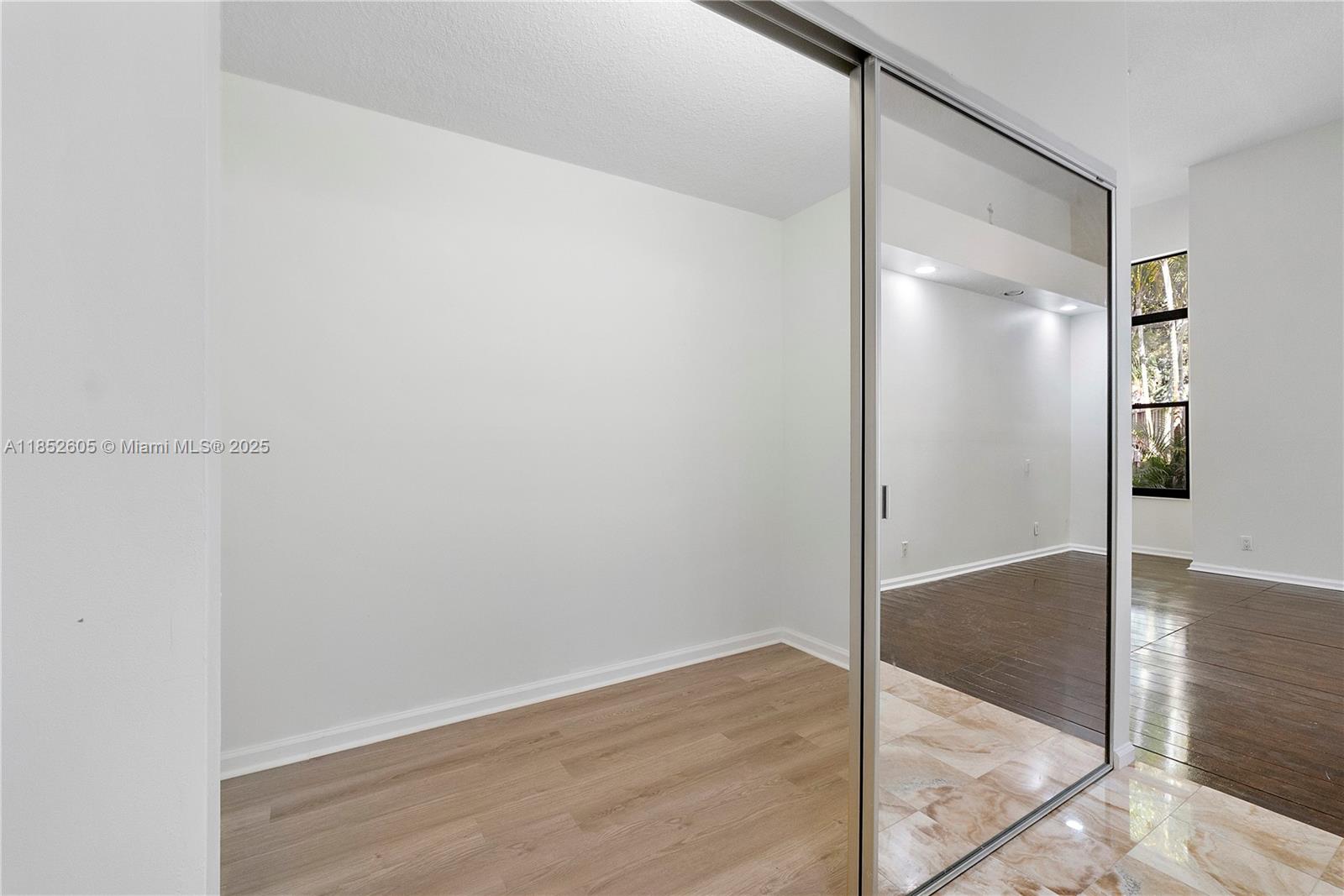 2449 Northwest 64th Street Boca Raton, FL 33496 - Photo 31 of 50 a view of a room with wooden floor