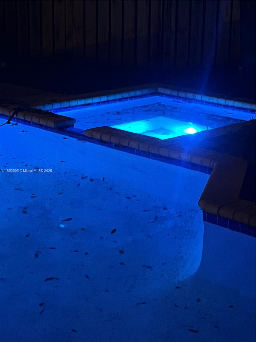 2449 Northwest 64th Street Boca Raton, FL 33496 - Photo 34 of 50 a view of empty room with wooden floor