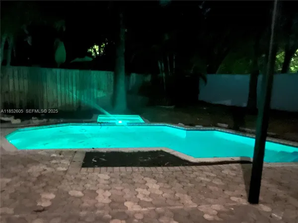 a view of backyard with wooden floor