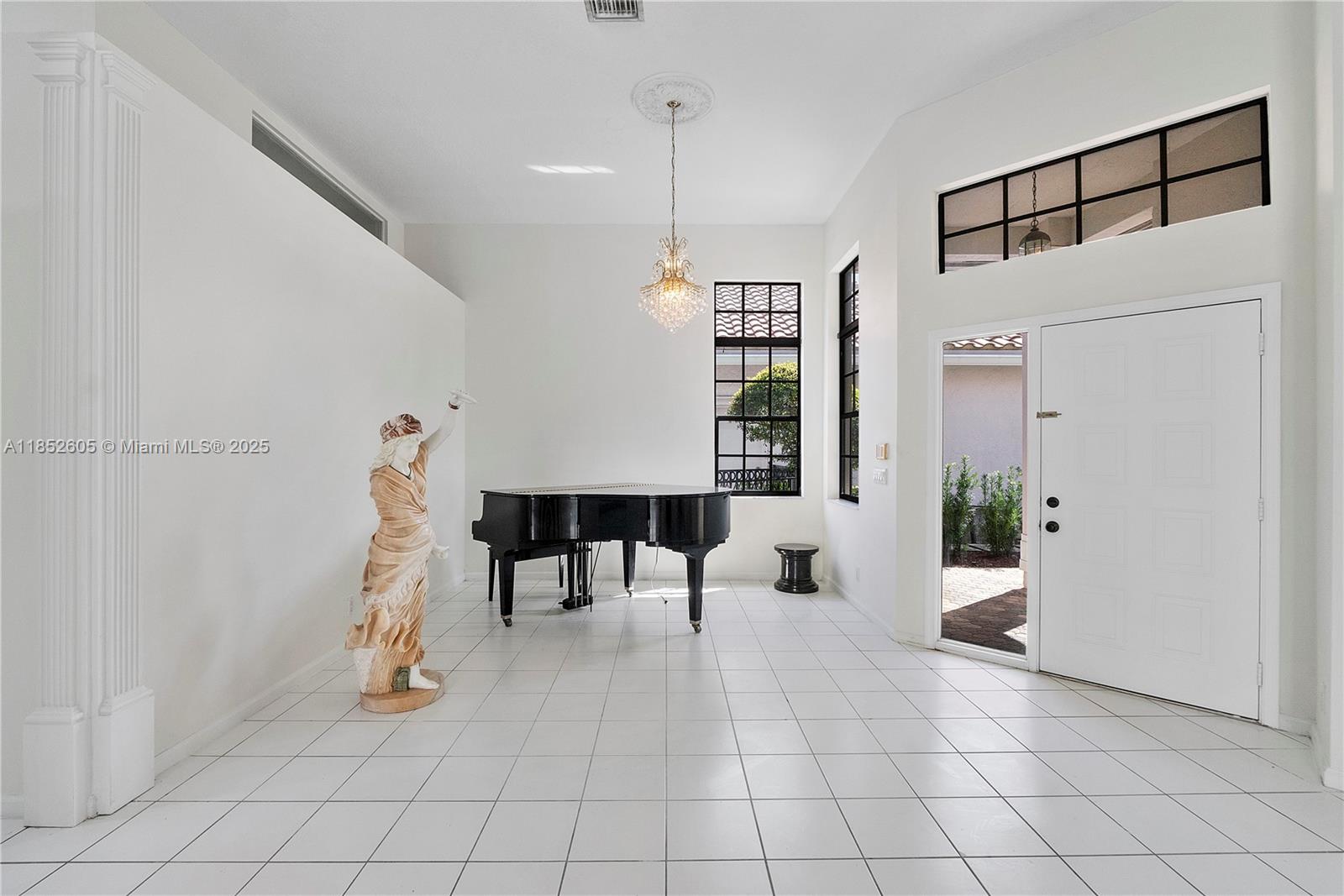2449 Northwest 64th Street Boca Raton, FL 33496 - Photo 10 of 50 a living room with furniture