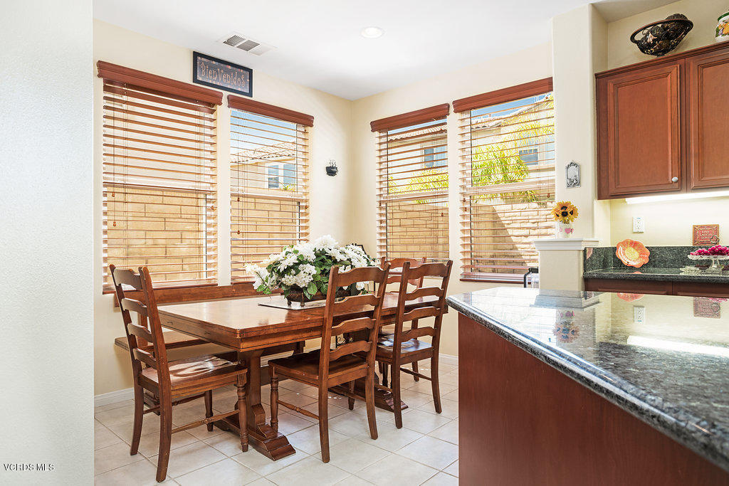 13709 Swift Run Street Moorpark, CA 93021 - Photo 14 of 34 a dining room with furniture and windows