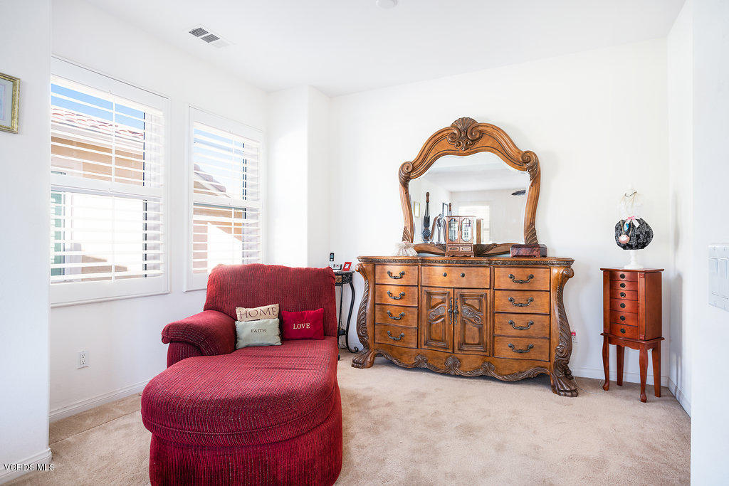 13709 Swift Run Street Moorpark, CA 93021 - Photo 19 of 34 a living room with furniture and a window