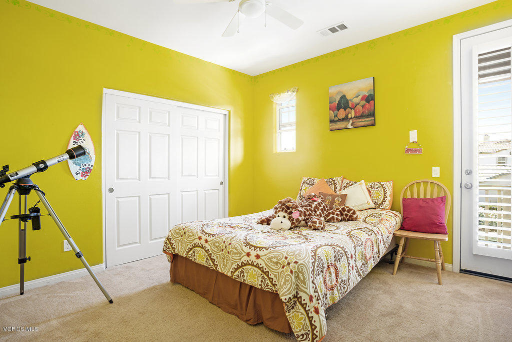13709 Swift Run Street Moorpark, CA 93021 - Photo 25 of 34 a bedroom with a bed and a window