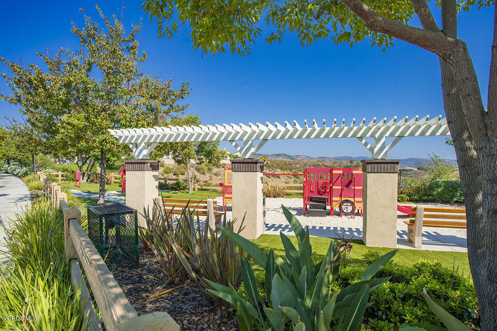 13709 Swift Run Street Moorpark, CA 93021 - Photo 34 of 34 a view of a patio with table and chairs potted plants