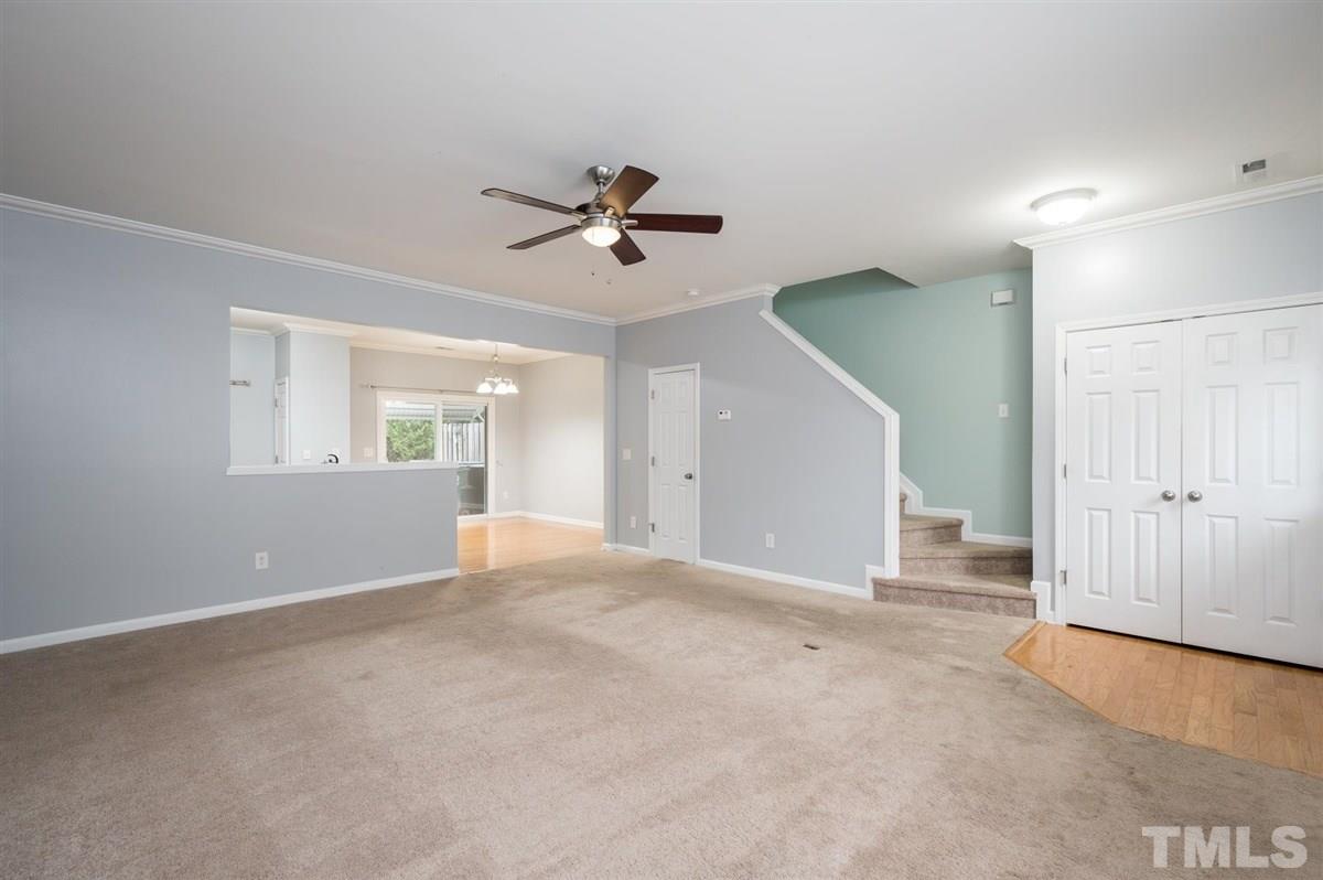 8311 Clasara Circle Raleigh, NC 27613 - Photo 4 of 27 a view of an empty room with a window