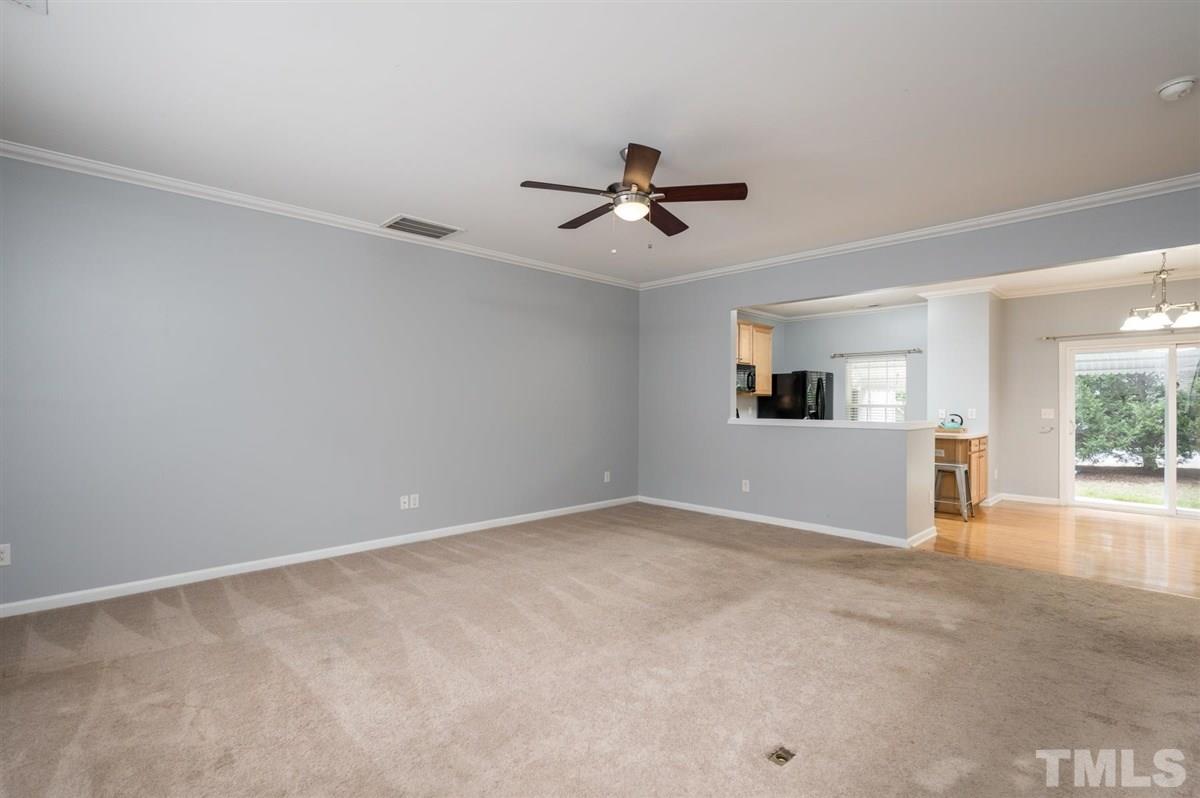 8311 Clasara Circle Raleigh, NC 27613 - Photo 6 of 27 a view of empty room with ceiling fan