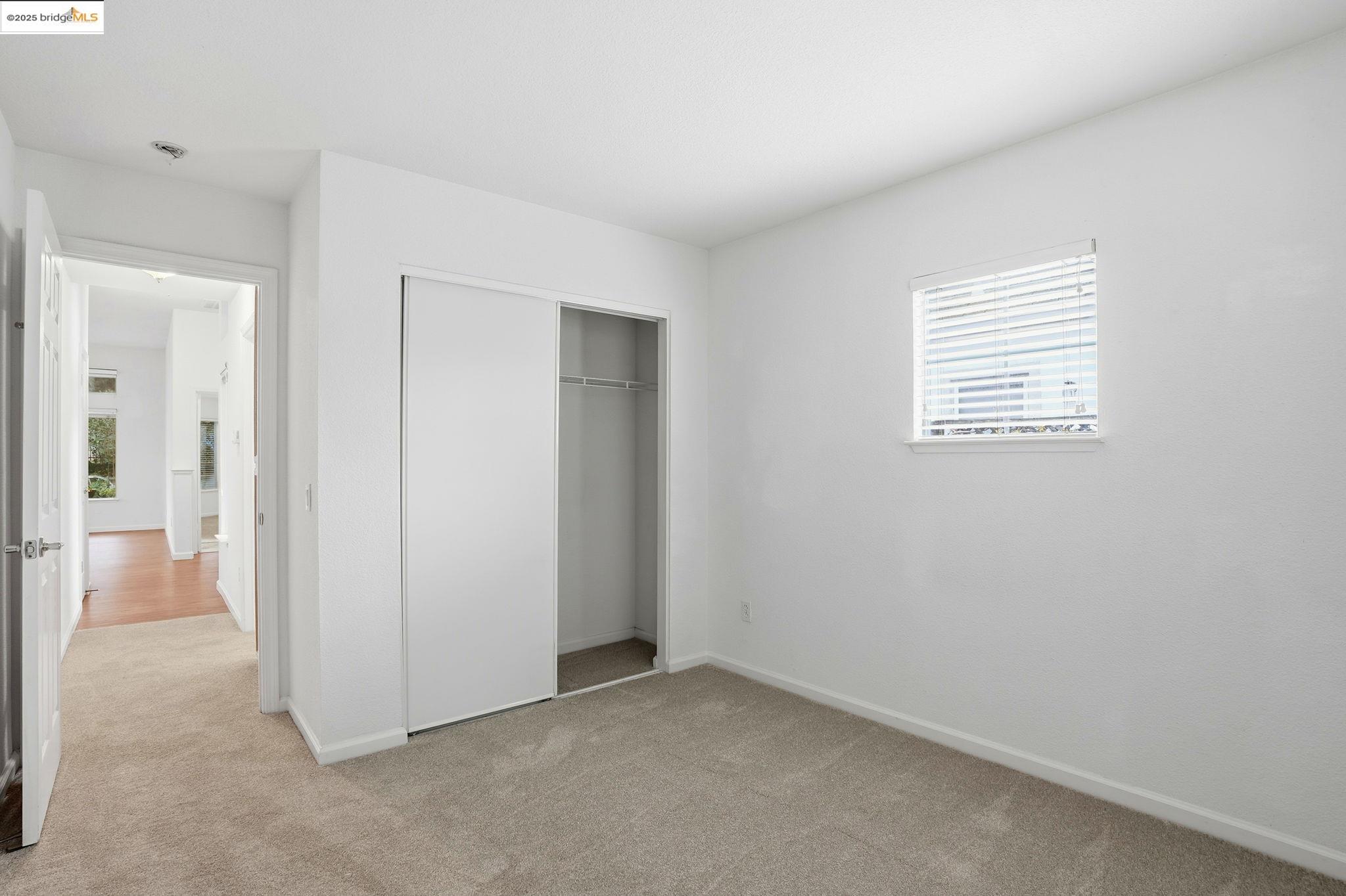 385 Ruby Terrace Brentwood, CA 94513 - Photo 19 of 37 an empty room with windows