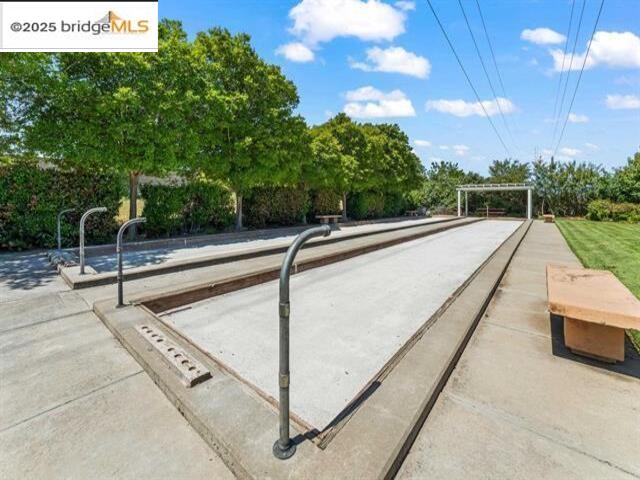 385 Ruby Terrace Brentwood, CA 94513 - Photo 35 of 37 a view of a swimming pool with a bench in the patio