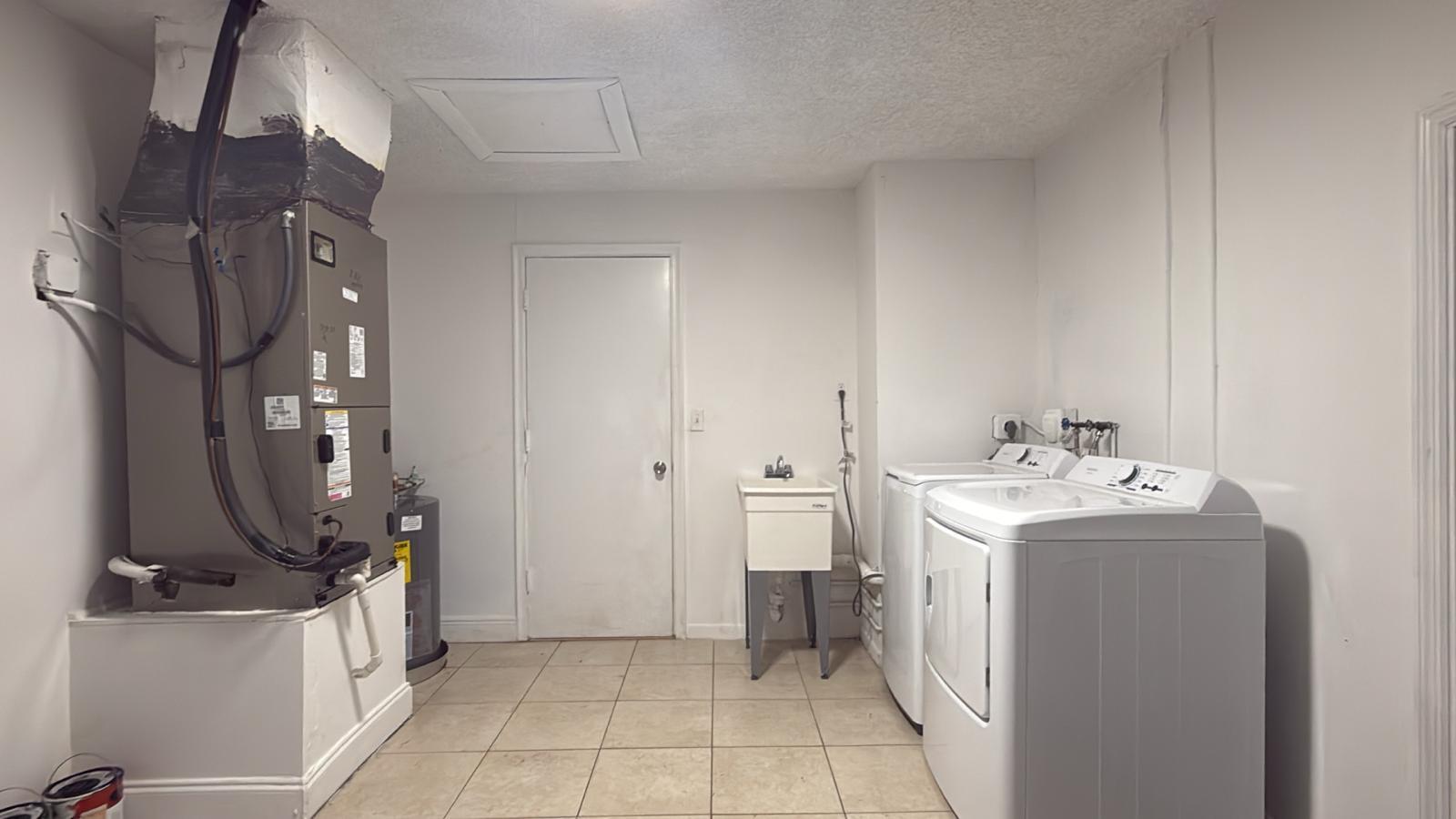 9244 Southwest 2nd Street Boca Raton, FL 33428 - Photo 10 of 11 a bathroom with a sink a toilet and shower