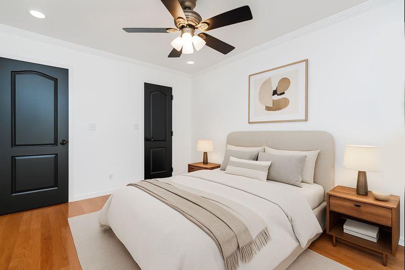 248 Bay 19th Street, Unit B Brooklyn, NY 11214 - Photo 13 of 14 a bedroom with a bed and a ceiling fan