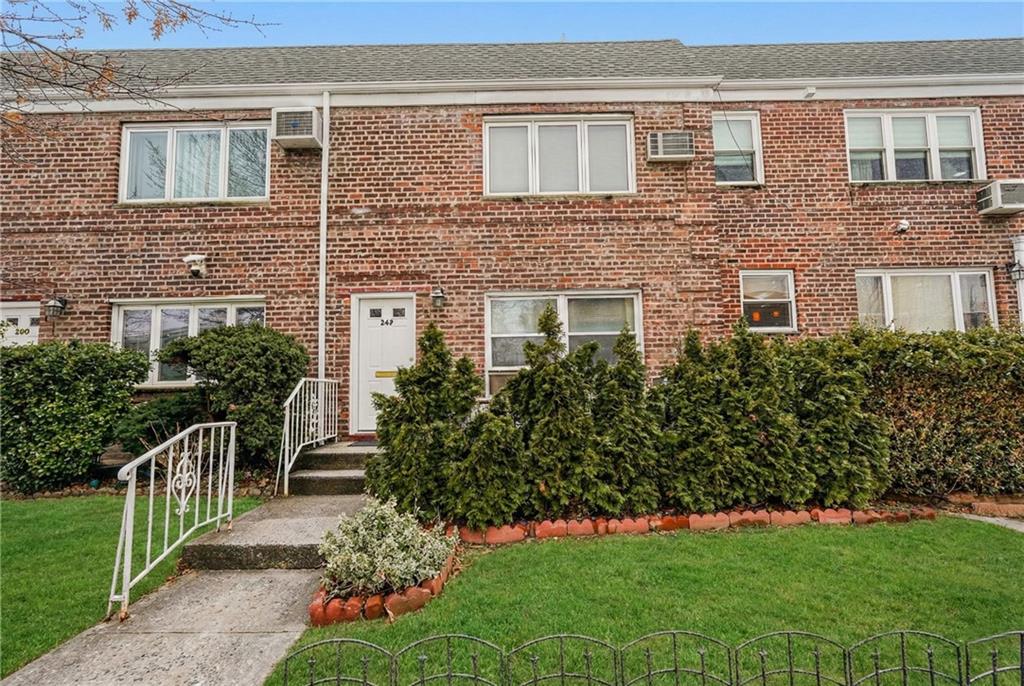 248 Bay 19th Street, Unit B Brooklyn, NY 11214 - Photo 2 of 14 a front view of a house with a garden