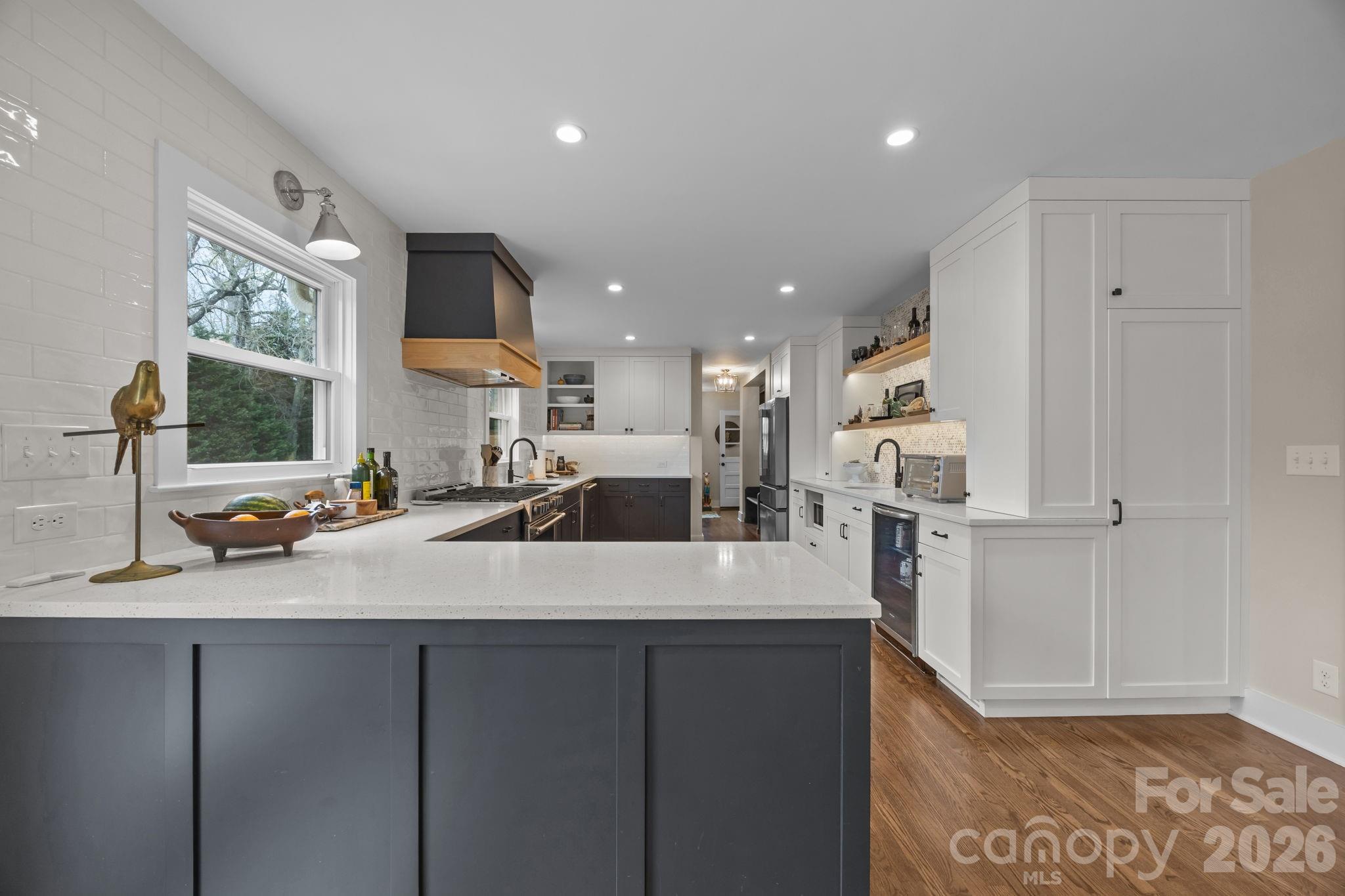 1141 Doby Court Fort Mill, SC 29715 - Photo 15 of 48 a large white kitchen with a large window