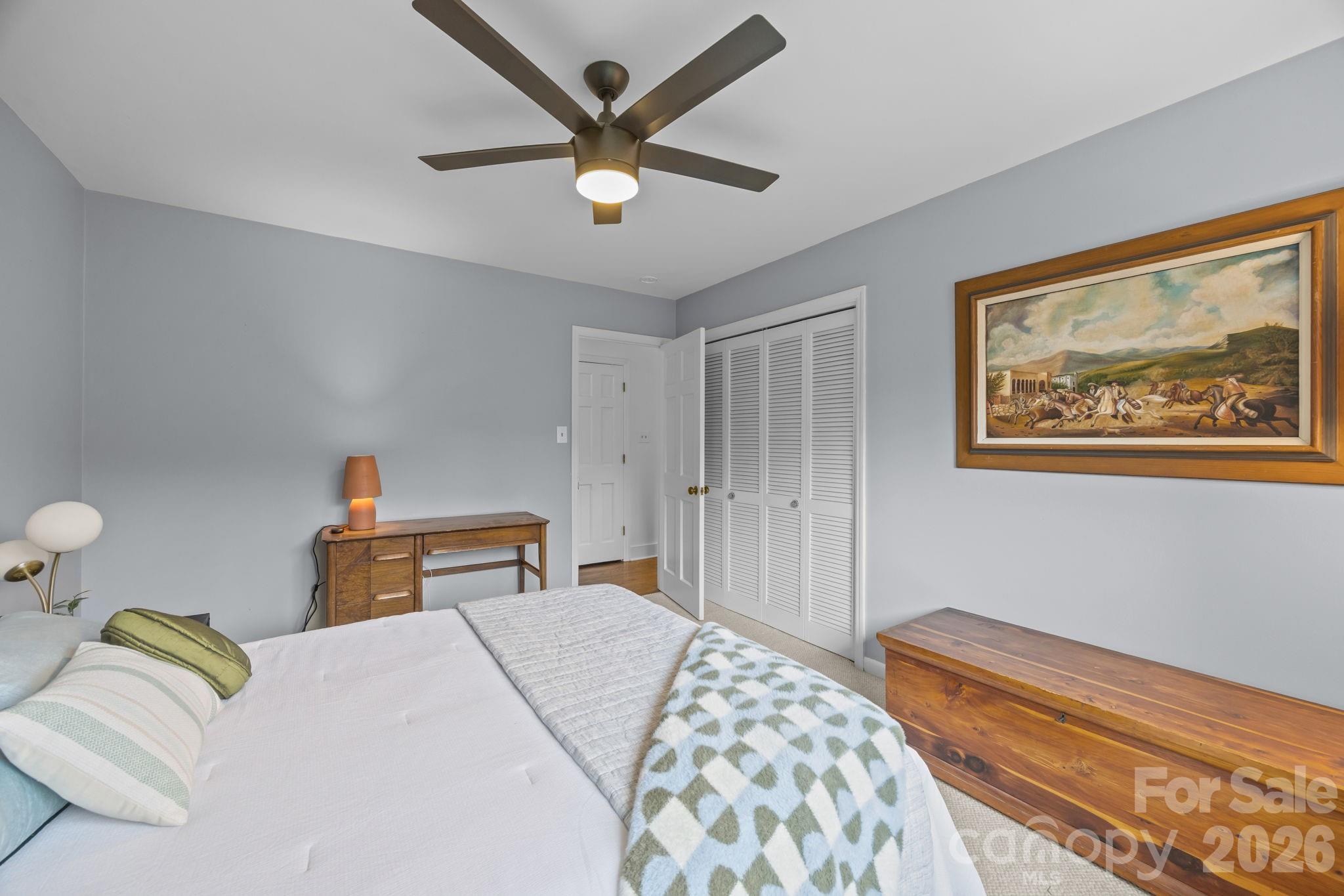 1141 Doby Court Fort Mill, SC 29715 - Photo 21 of 48 a bedroom with a bed and a painting on the wall