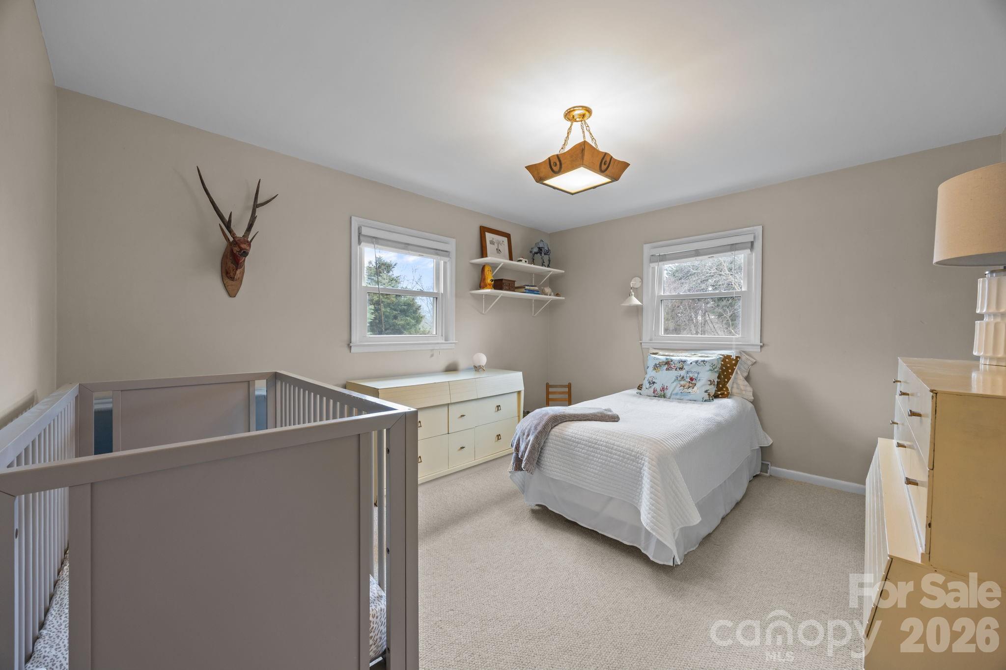 1141 Doby Court Fort Mill, SC 29715 - Photo 22 of 48 a bedroom with a bed and a window