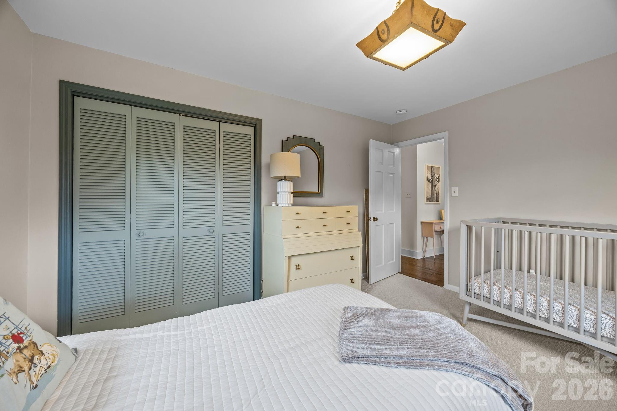 1141 Doby Court Fort Mill, SC 29715 - Photo 23 of 48 a bedroom with a bed and a dresser