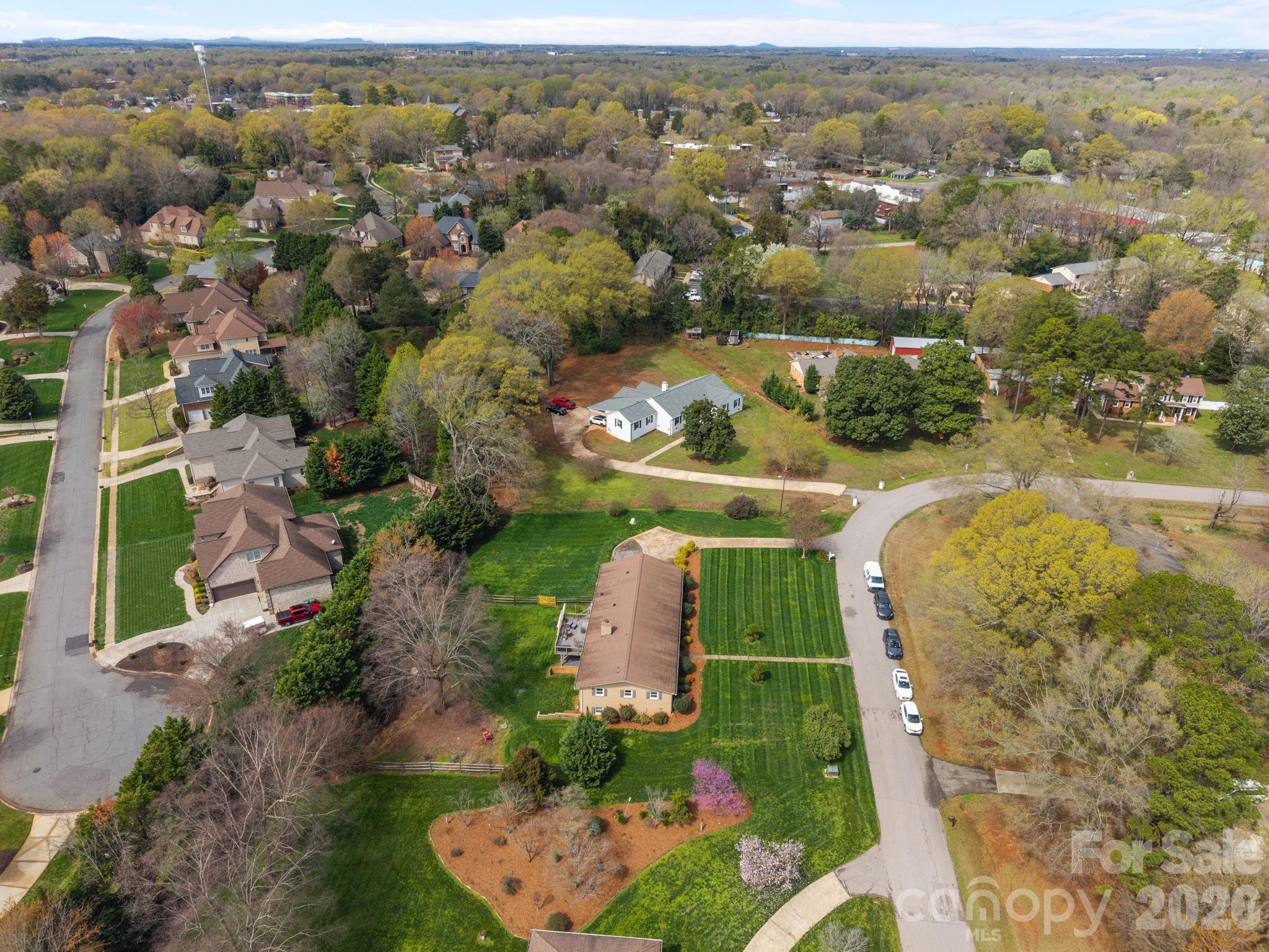 1141 Doby Court Fort Mill, SC 29715 - Photo 42 of 48 an aerial view of a house with a yard and lake view