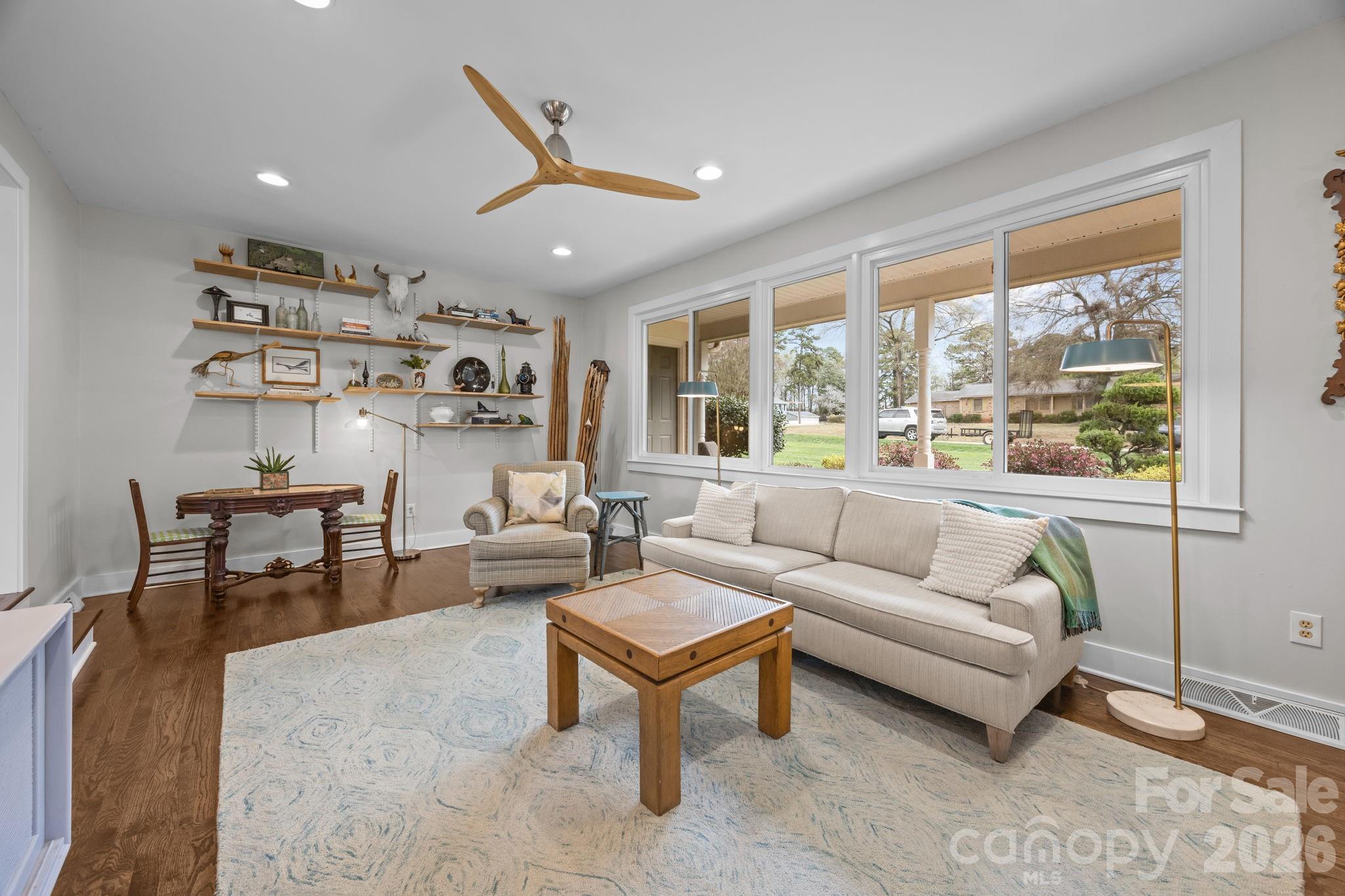 1141 Doby Court Fort Mill, SC 29715 - Photo 8 of 48 a living room with furniture and a large window