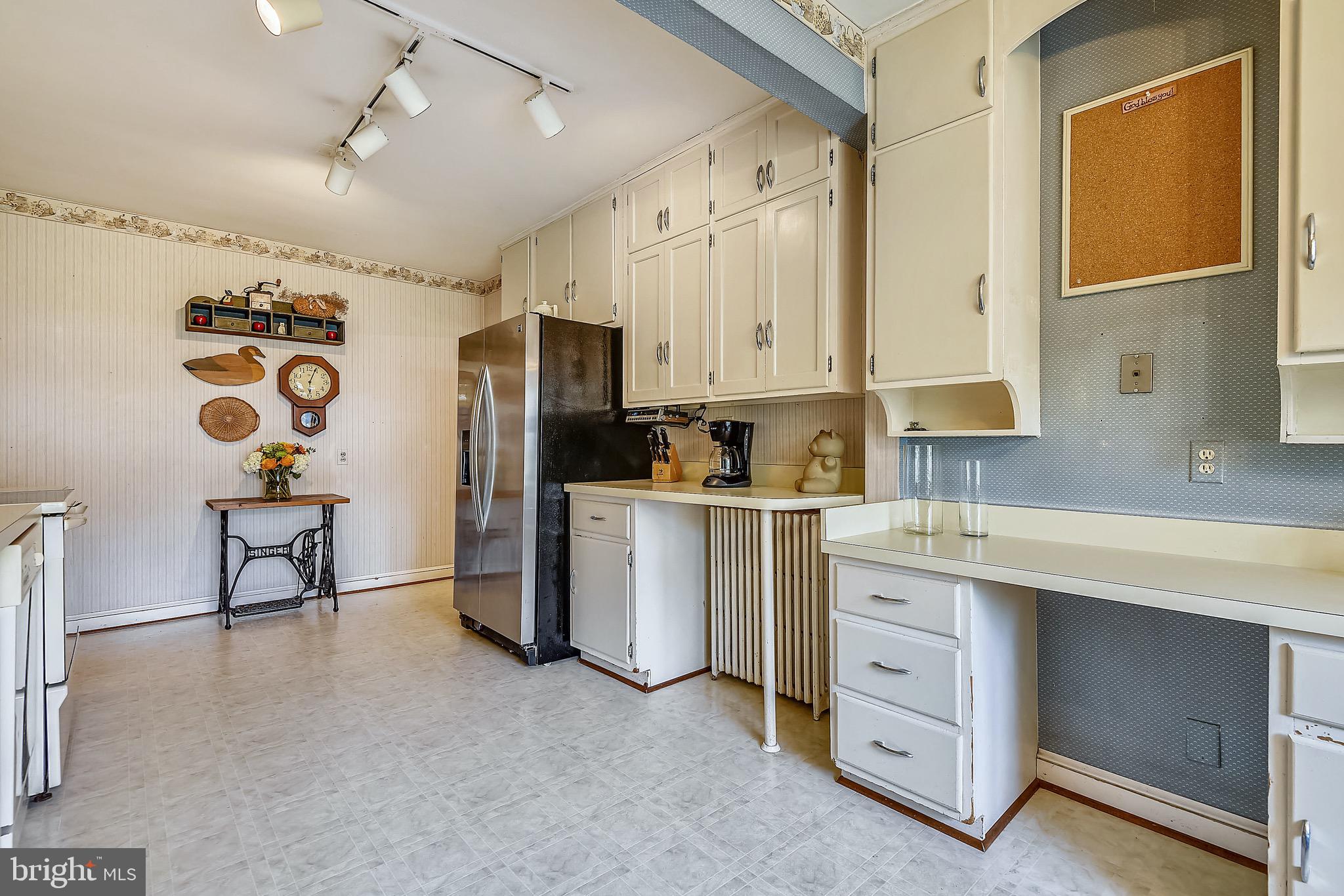 1821 Sherwood Road Silver Spring, MD 20902 - Photo 8 of 25 Kitchen with built in workspace