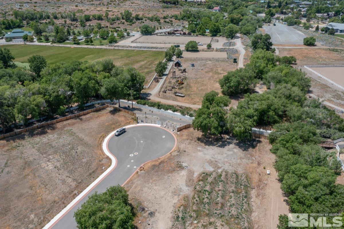 6345 Falabella Way, Unit 5 Reno, NV 89511 - Photo 11 of 26 an aerial view of a house with outdoor space and street view