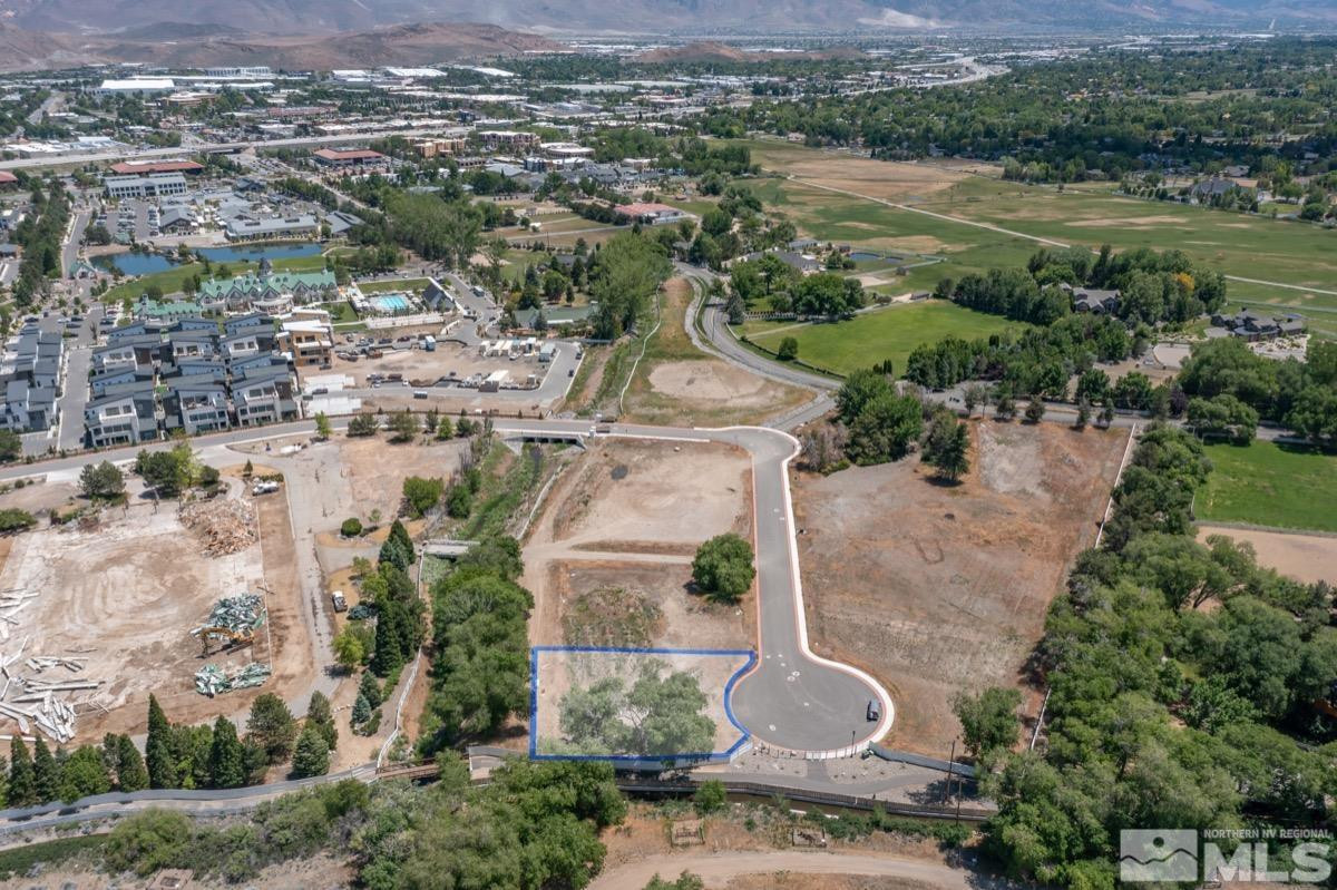 6345 Falabella Way, Unit 5 Reno, NV 89511 - Photo 24 of 26 an aerial view of residential houses with outdoor space and river