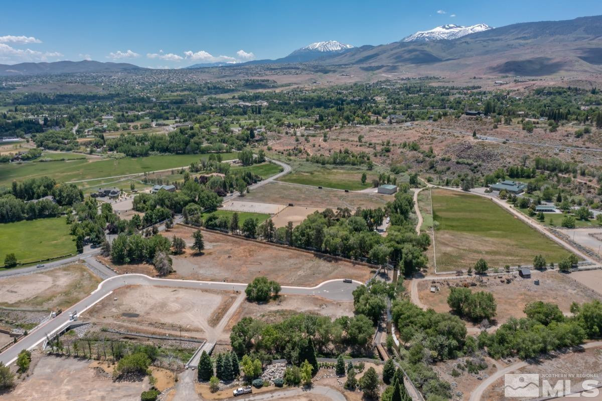 6345 Falabella Way, Unit 5 Reno, NV 89511 - Photo 5 of 26 an aerial view of a city with lots of residential buildings