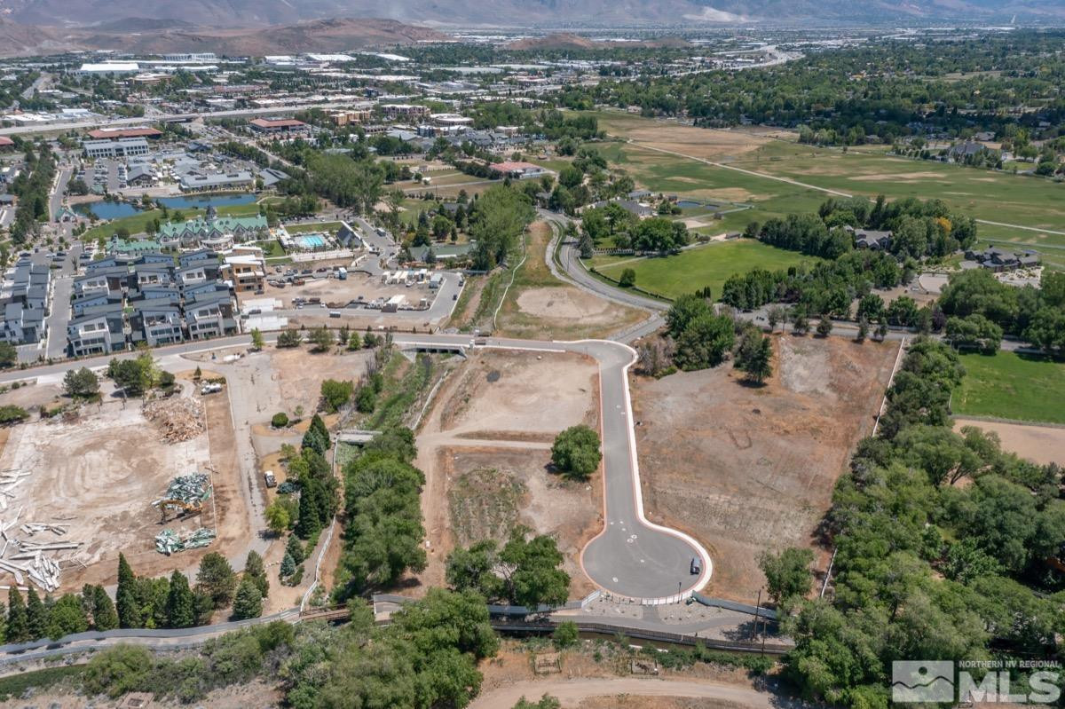 6345 Falabella Way, Unit 5 Reno, NV 89511 - Photo 7 of 26 an aerial view of residential houses with outdoor space and river