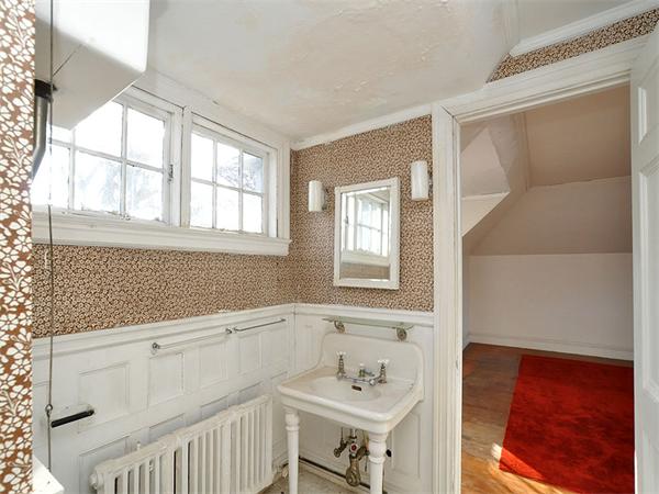 184 Dean Road Brookline, MA 02445 - Photo 5 of 13 a bathroom with a bathtub and a sink