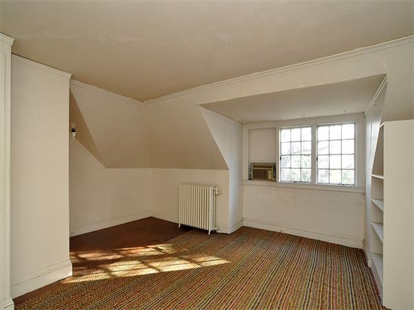 184 Dean Road Brookline, MA 02445 - Photo 6 of 13 a view of an empty room with window
