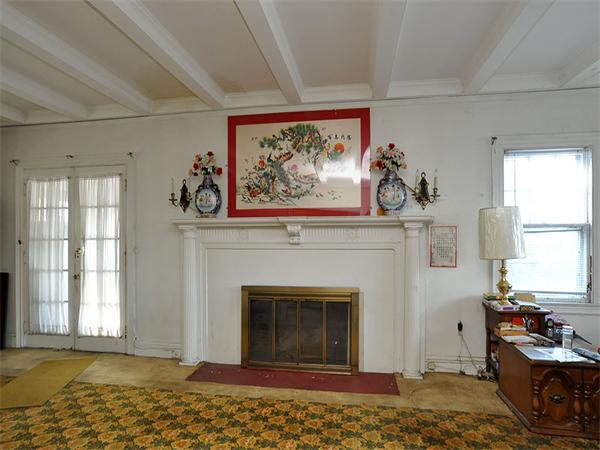 184 Dean Road Brookline, MA 02445 - Photo 9 of 13 a living room with furniture and a fireplace