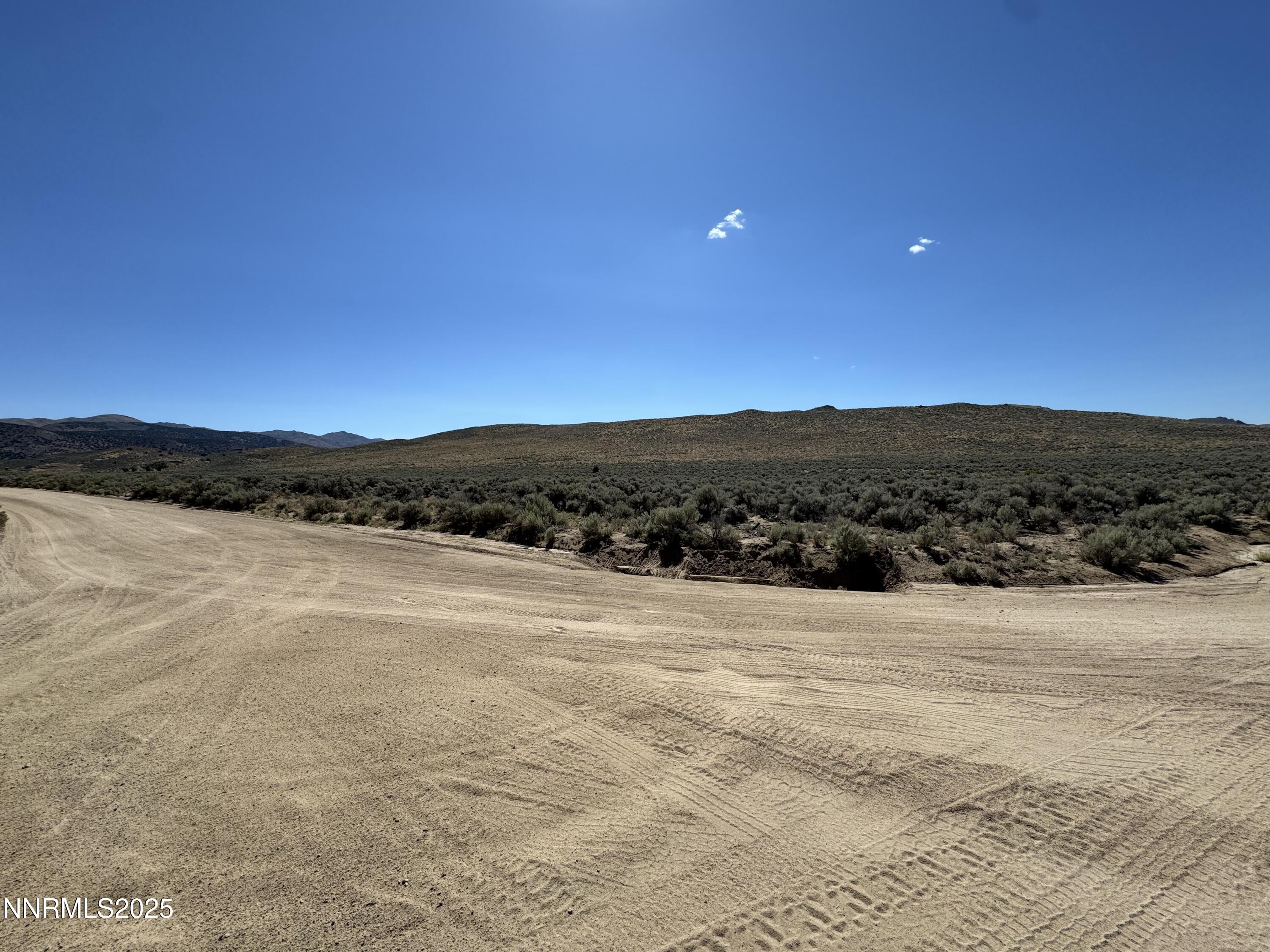 0 Dixie Lane, Unit 7836115 Reno, NV 89508 - Photo 3 of 9 a view of lake and mountain