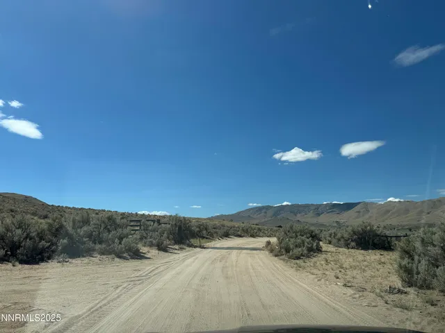 a view of mountain with sunset view