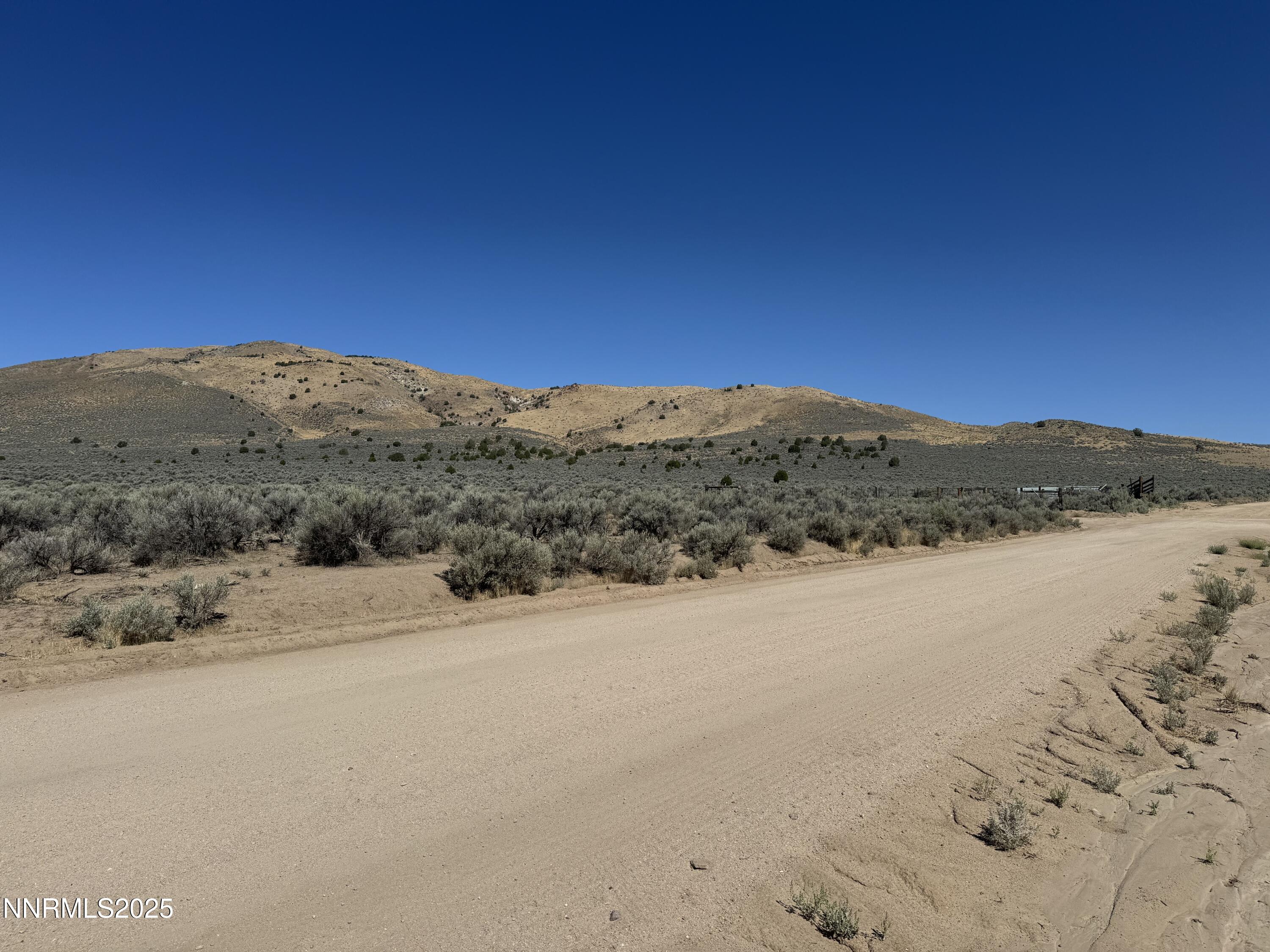 0 Dixie Lane, Unit 7836115 Reno, NV 89508 - Photo 8 of 9 a view of lake and mountain